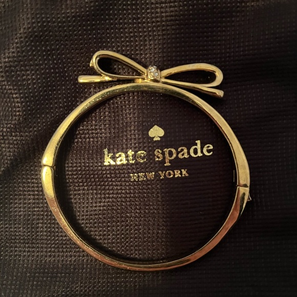 kate spade Jewelry Kate Spade Gold Bow Bangle Worn Clear Stones